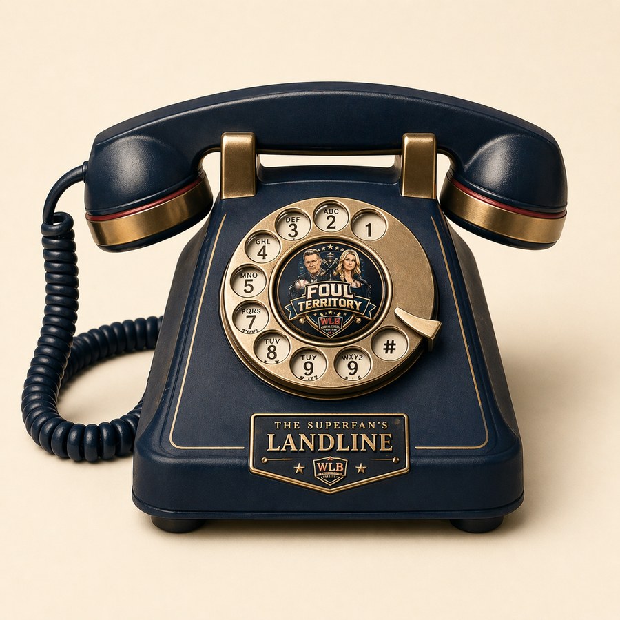 Retro navy rotary desk telephone with brass fittings, a Foul Territory medallion on the dial, and a THE SUPERFAN'S LANDLINE nameplate